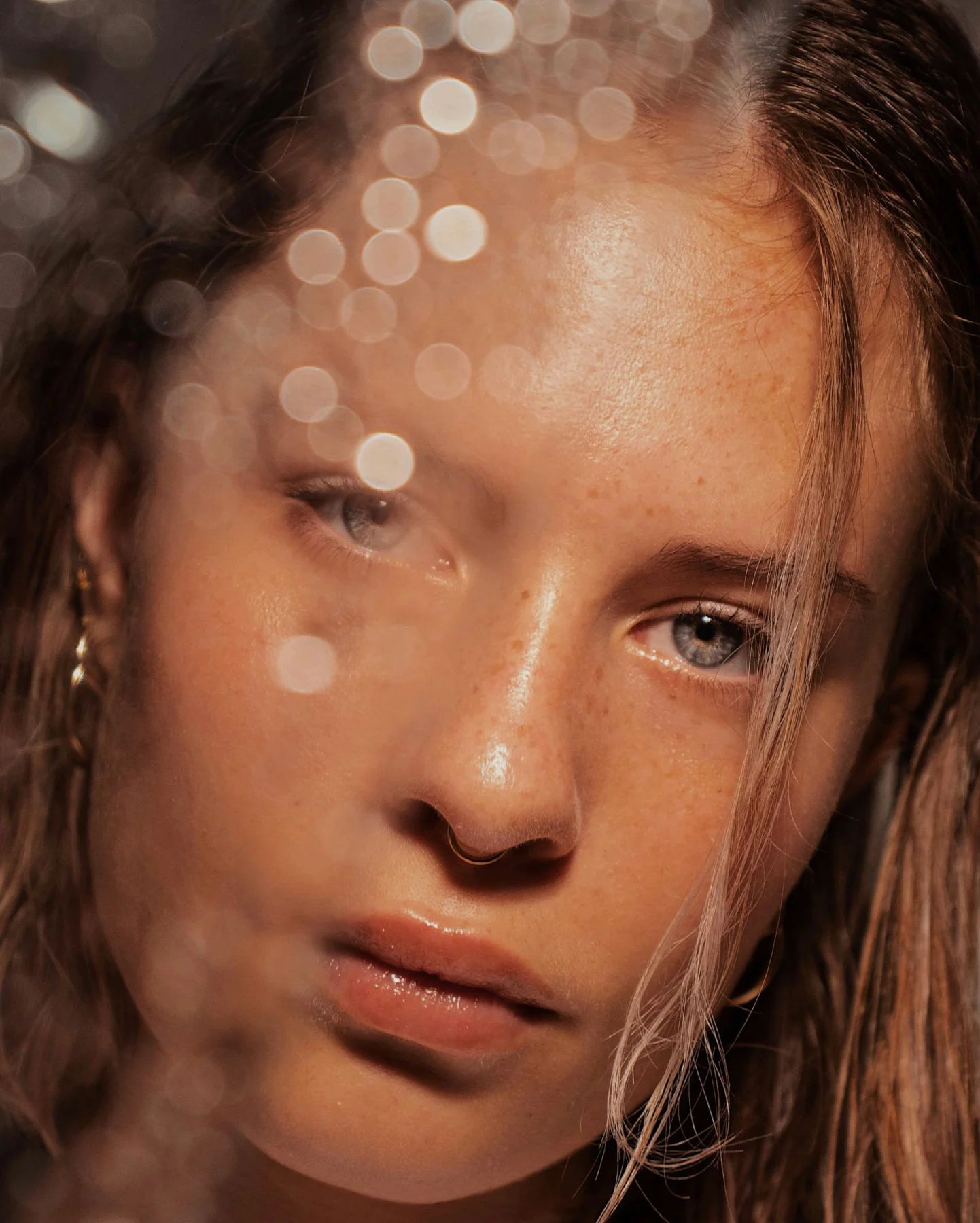 Model with dewy, healthy skin